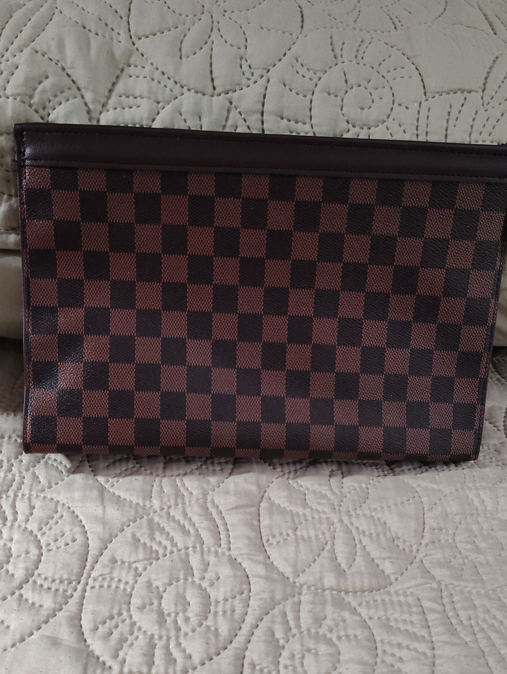 Woman's Brown Checkered Leather Clutch - Sleek Travel Pouch
